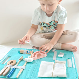 Liitle dentist play set in a felt bag