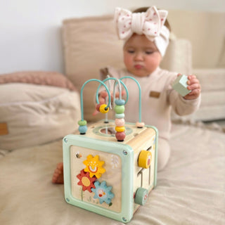 Motor activity play cube in pastel shades