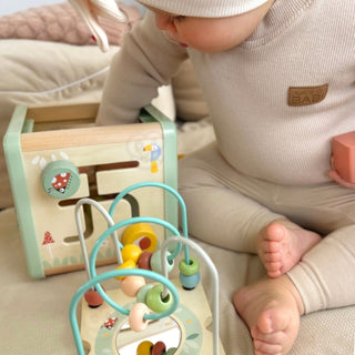 Motor activity play cube in pastel shades