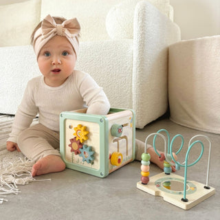 Motor activity play cube in pastel shades