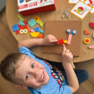 Tap tap  hammering game with a cork base and picture cards