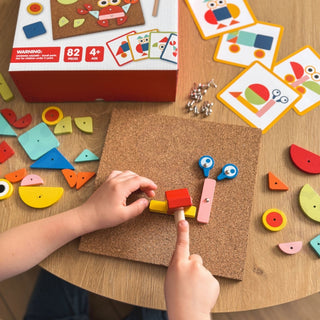 Tap tap  hammering game with a cork base and picture cards