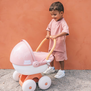 Guļamie leļļu ratiņi ar kulbu