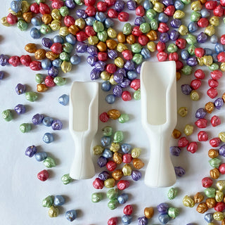 Rainbow sensory set with sensory tools. White