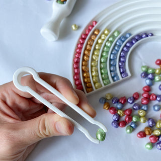 Rainbow sensory set with sensory tools. White