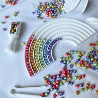 Rainbow sensory set with sensory tools. White