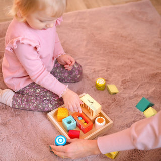 Sensory blocks in a wooden frame
