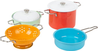 The colorful set of play pots and kitchen utensils