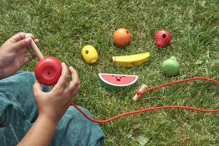Wooden fruit for threading, with a wooden needle, 7 pcs